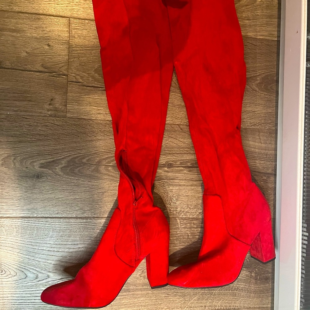 Red knee-high boots